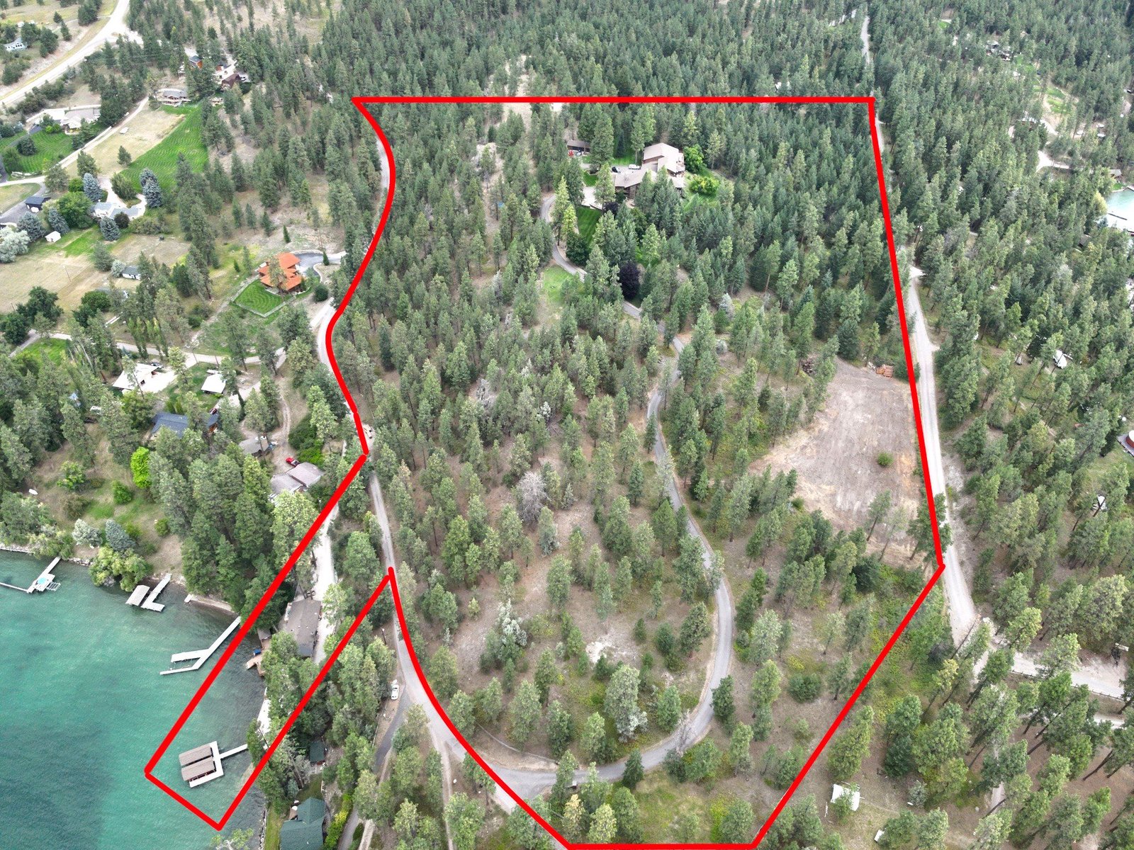 Aerial view of Eagle's Bluff 27-acre private peninsula estate on Flathead Lake with property boundary lines